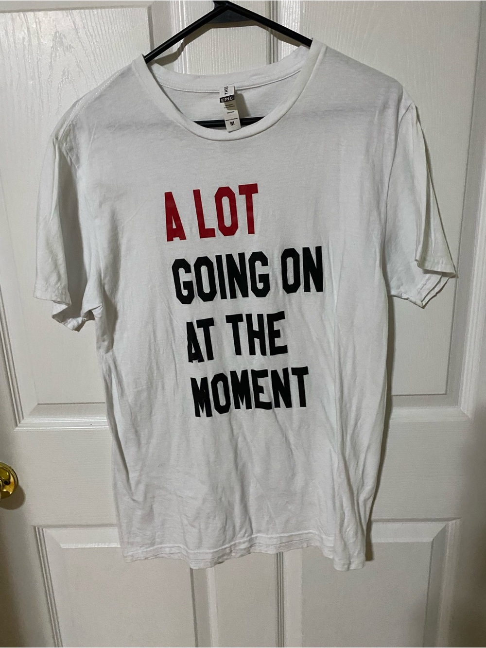 White Graphic Tee "A LOT" Red & Black Text
